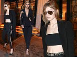 Picture Shows: Gigi Hadid  January 24, 2016\n \n Model Gigi Hadid is seen out and about in Paris, France. Gigi showed off her svelte figure in a midriff baring crop top and matching pantsuit.\n \n Non Exclusive\n UK RIGHTS ONLY\n \n Pictures by : FameFlynet UK © 2016\n Tel : +44 (0)20 3551 5049\n Email : info@fameflynet.uk.com