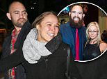 EXCLUSIVE: Ronda Rousey and boyfriend Travis Browne climb over a snow bank after the Saturday Night Live afterparty in NYC\n\nPictured: Ronda Rousey, Travis Browne\nRef: SPL1214195  240116   EXCLUSIVE\nPicture by: XactpiX/Splash News\n\nSplash News and Pictures\nLos Angeles: 310-821-2666\nNew York: 212-619-2666\nLondon: 870-934-2666\nphotodesk@splashnews.com\n