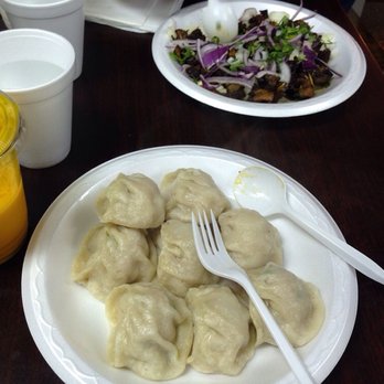 Lali Guras - Oh yes, mine all mine. Chicken momos & goat bhutan in the background. - Jackson Heights, NY, United States