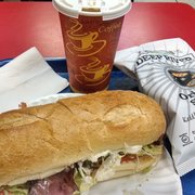 American Hero Subs - Hot corned beef, pastrami, and swiss regular sub with chips and coffee - Long Island City, NY, United States