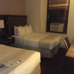 Holiday Inn NEW YORK-SOHO - This is the room @ $350 per night (mid-June 2014 rate) - note it has an air conditioner window wall unit. - New York, NY, United States